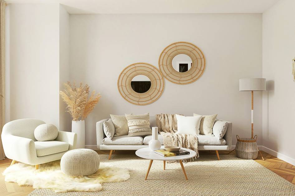 Editor relaxing in a stylish poolside lounge chair surrounded by curated outdoor decor and greenery