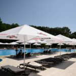 Why Your Backyard Feels Bare Without Poolside Umbrellas with Stand