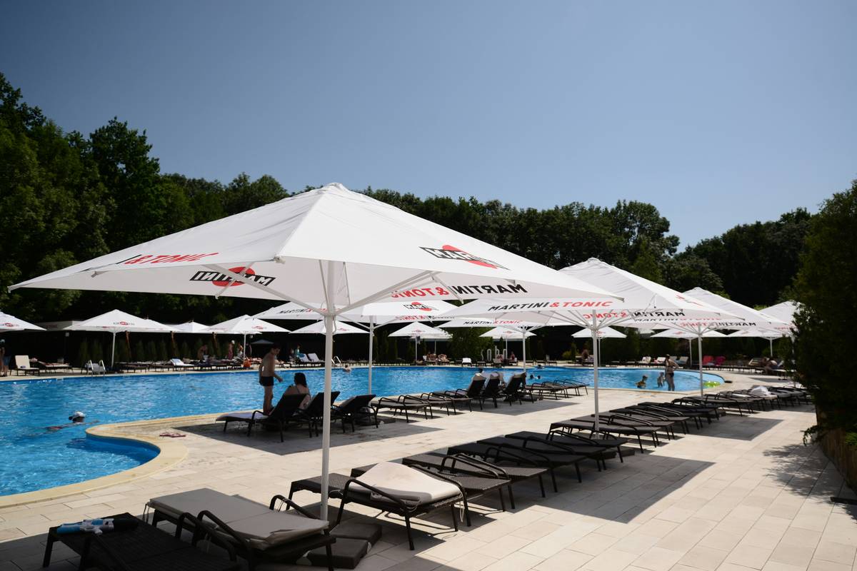Why Your Backyard Feels Bare Without Poolside Umbrellas with Stand